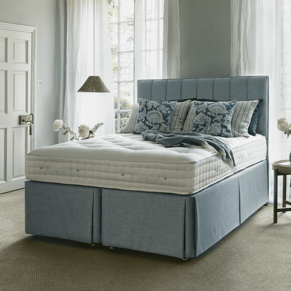 Luxury divan bed with upholstered headboard