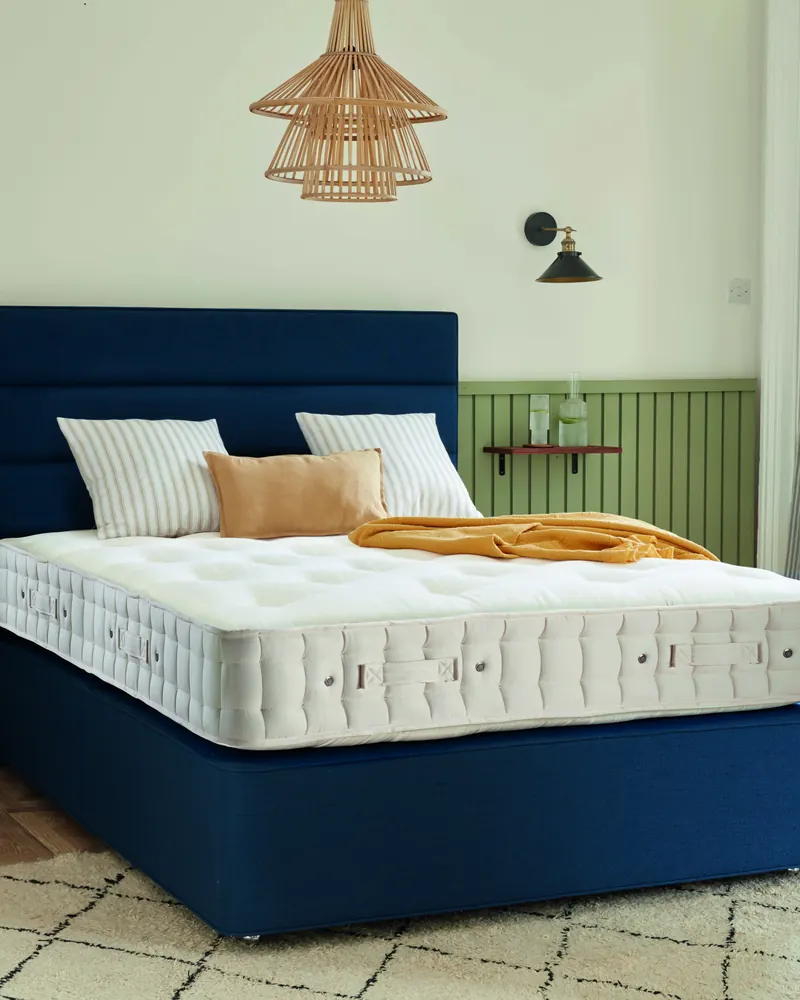 Hypnos Orthos Support mattress dressed on a divan base