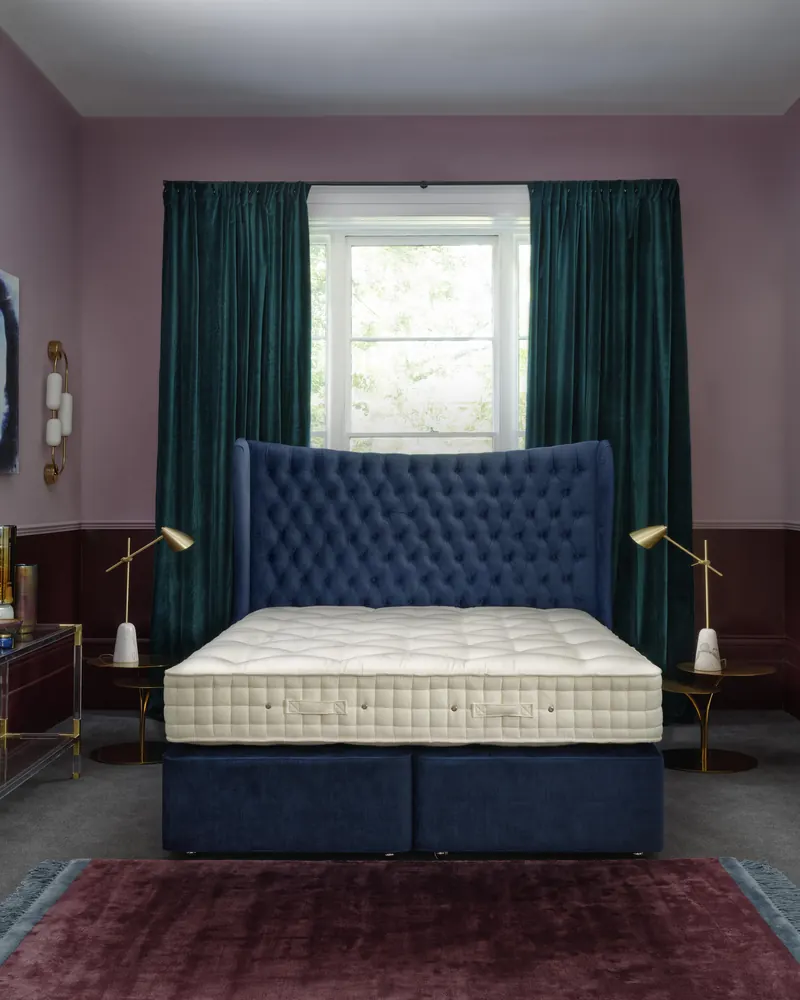 Hypnos Wool Origins bed dressed in a bedroom