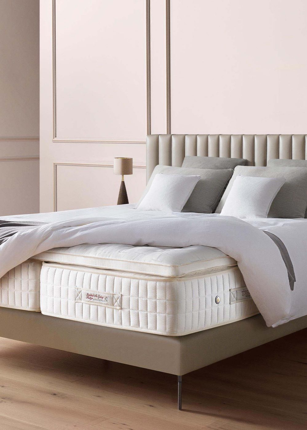 Tréca Imperial Air Spring bed with vertical upholstery, dressed in a French bedroom setting